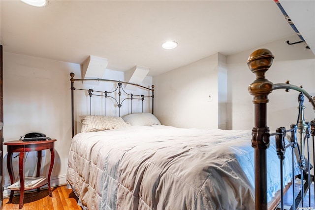 bedroom featuring light wood-type flooring