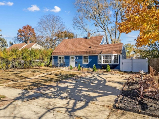 view of new england style home