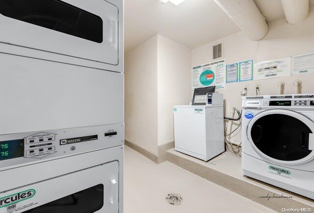 clothes washing area with separate washer and dryer and stacked washer / dryer