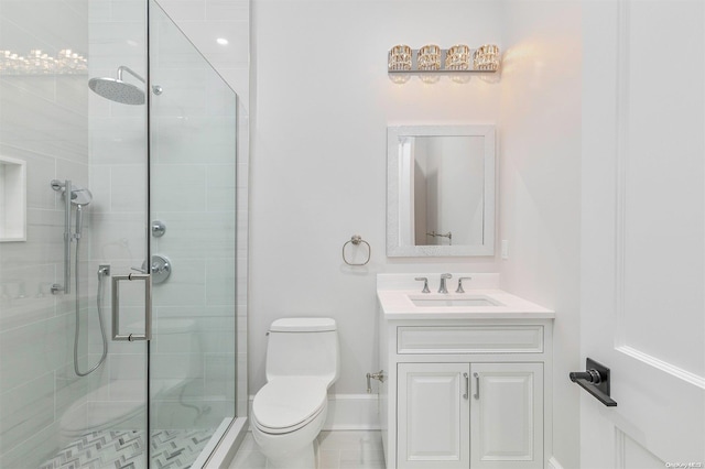 bathroom featuring walk in shower, vanity, and toilet