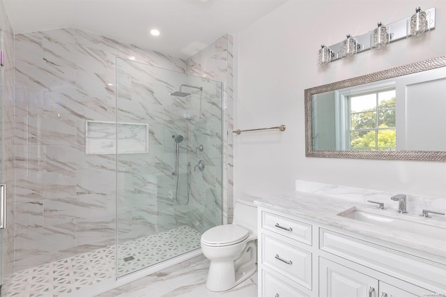 bathroom featuring vanity, walk in shower, and toilet