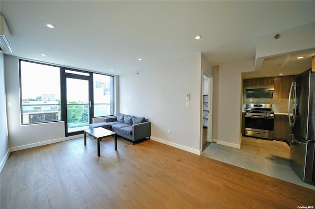 living room with light hardwood / wood-style floors