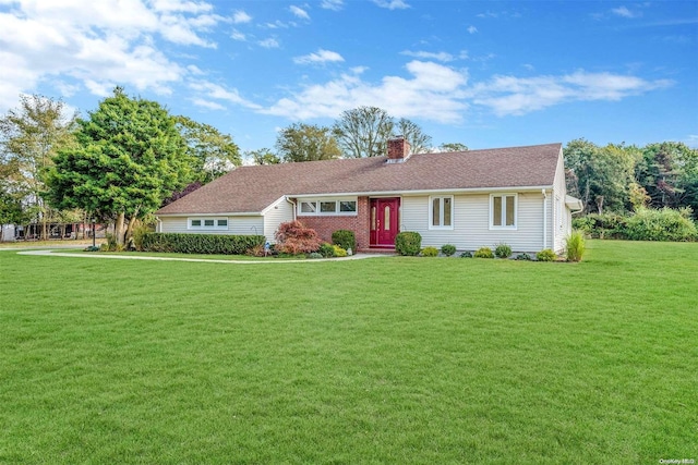 single story home with a front lawn