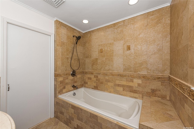 bathroom with tile patterned floors, tiled shower / bath combo, and crown molding