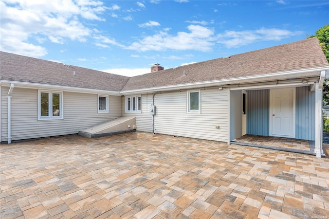 rear view of property with a patio area