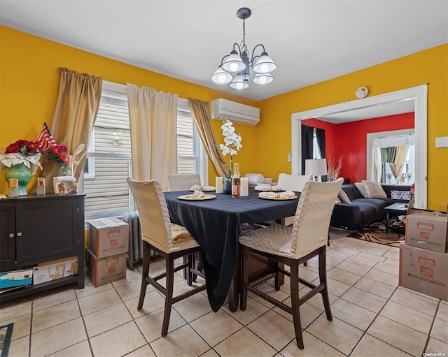 dining room featuring a chandelier, a wall mounted AC, a healthy amount of sunlight, and light tile patterned flooring