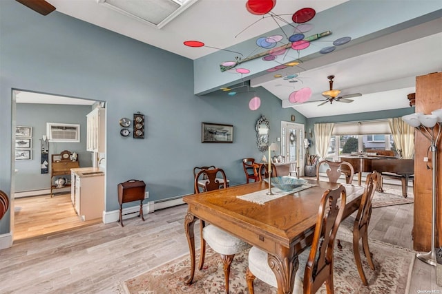 dining room featuring ceiling fan, a baseboard radiator, a wall mounted air conditioner, light hardwood / wood-style floors, and lofted ceiling