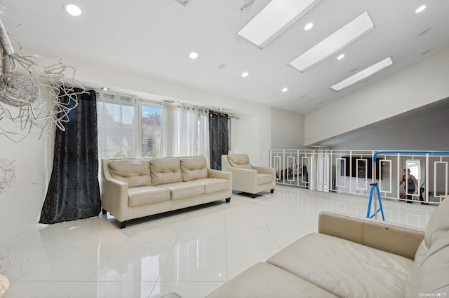 tiled living room with a skylight