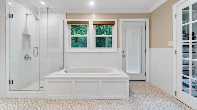 bathroom featuring crown molding, tile patterned floors, and independent shower and bath