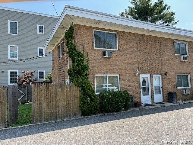 view of front of house featuring central AC unit