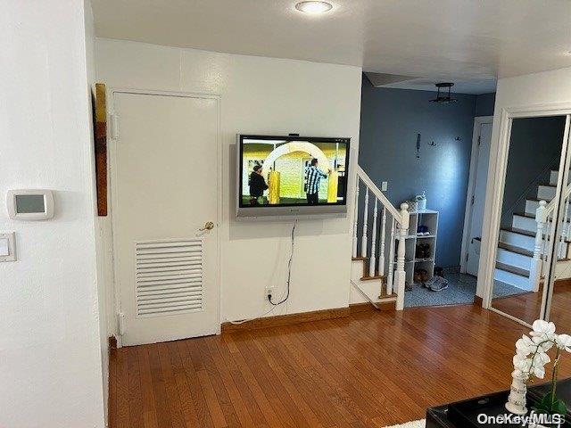 interior space with hardwood / wood-style floors