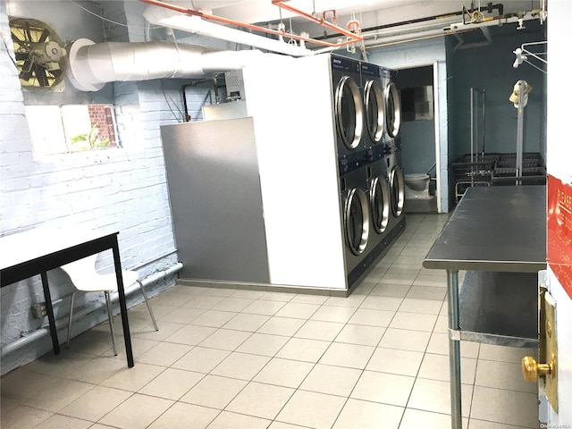 interior space featuring separate washer and dryer and stacked washer and clothes dryer