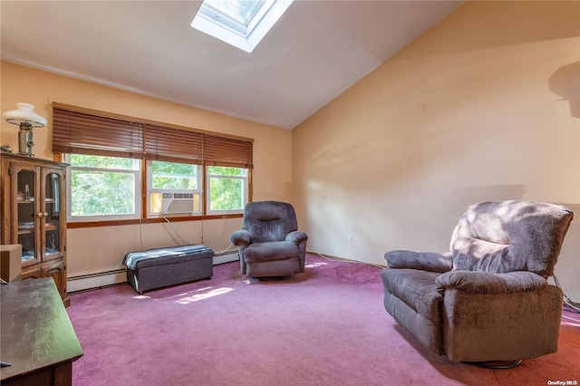 living area with carpet floors, baseboard heating, and vaulted ceiling with skylight