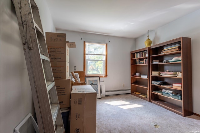 interior space featuring light carpet and baseboard heating