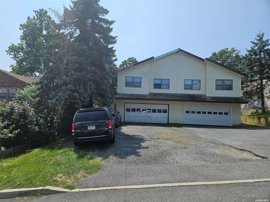 38-40 Lincoln Pl, Ossining, NY 10562 - view of front of home featuring a garage