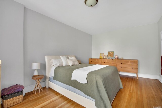 bedroom featuring hardwood / wood-style floors