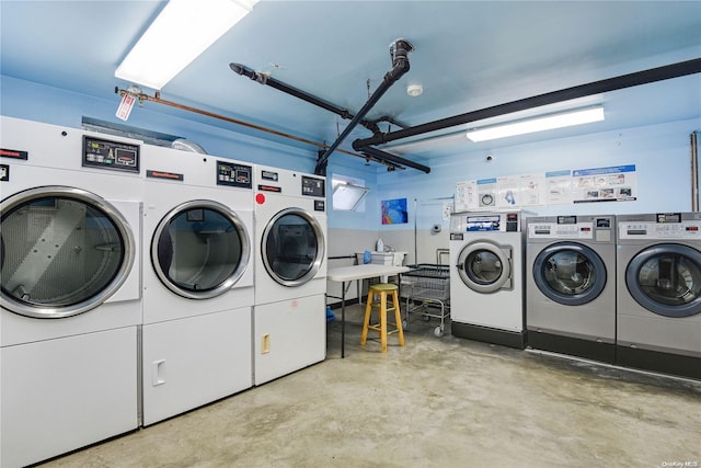 washroom with washer and clothes dryer