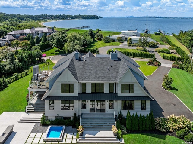 aerial view featuring a water view