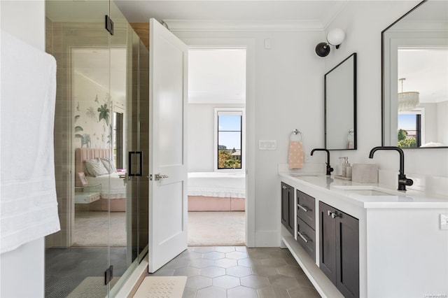 bathroom featuring tile patterned flooring, vanity, an enclosed shower, and crown molding