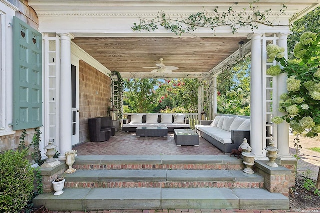 view of patio with ceiling fan, covered porch, and an outdoor hangout area