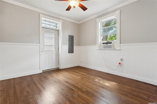 spare room with dark hardwood / wood-style flooring, electric panel, ceiling fan, and crown molding