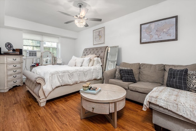 bedroom featuring hardwood / wood-style floors and ceiling fan