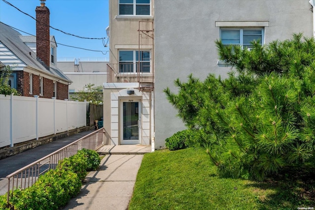 525 Bch 138th St Unit A2, Belle Harbor, NY 11694 - doorway to property featuring stucco siding