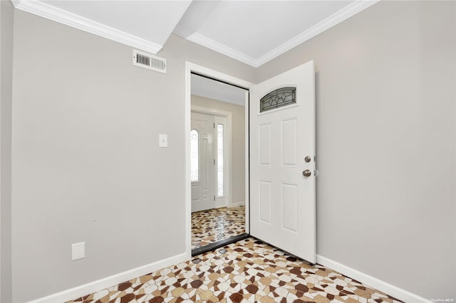 entryway with crown molding