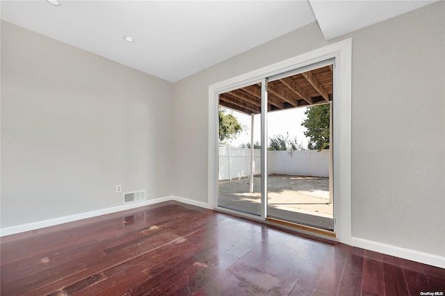 unfurnished room with hardwood / wood-style floors