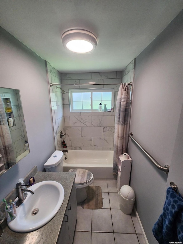 full bathroom featuring tile patterned floors, vanity, toilet, and shower / bathtub combination with curtain