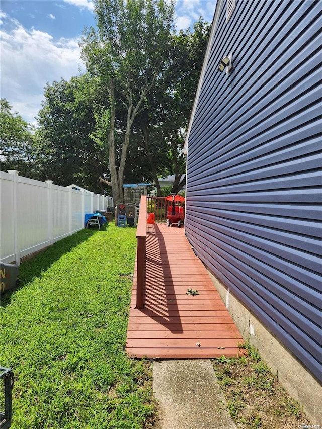 view of yard with a deck