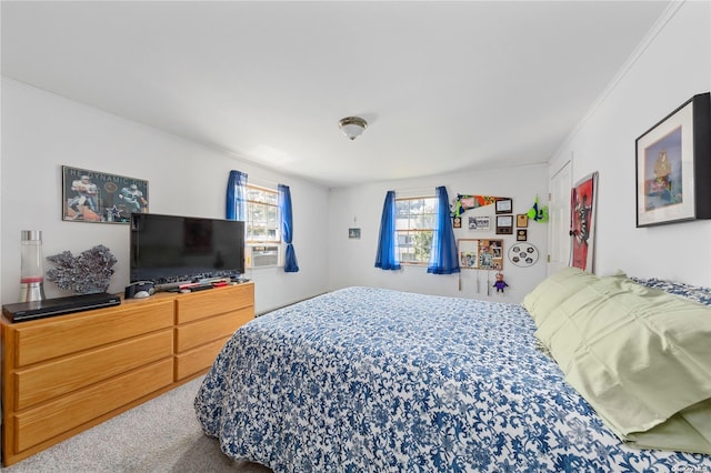 bedroom with carpet and ornamental molding