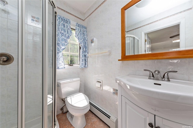 bathroom with a baseboard radiator, walk in shower, toilet, vanity, and tile walls