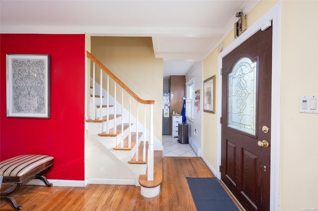 entrance foyer with light hardwood / wood-style flooring and plenty of natural light