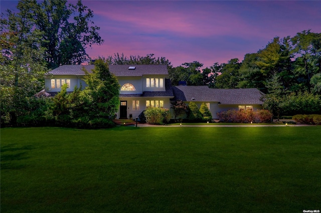 view of front of property with a front lawn