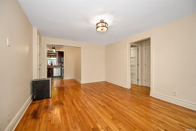 unfurnished room featuring light wood-type flooring