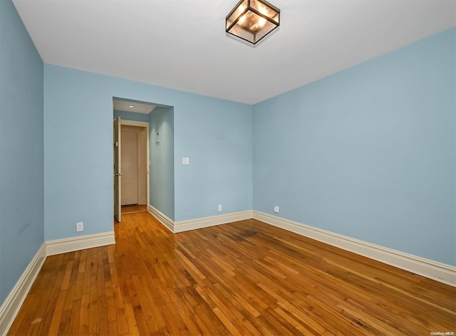 unfurnished room featuring light hardwood / wood-style flooring