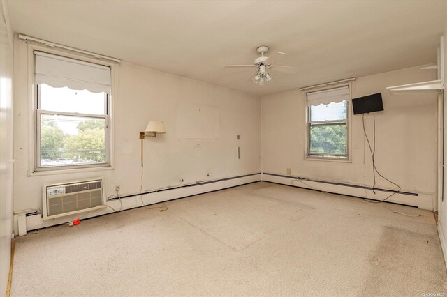 carpeted empty room with a wall unit AC and ceiling fan