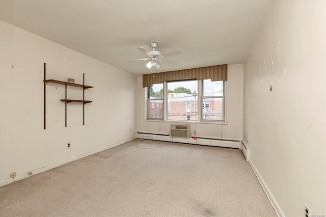 empty room with light carpet, ceiling fan, and a baseboard heating unit