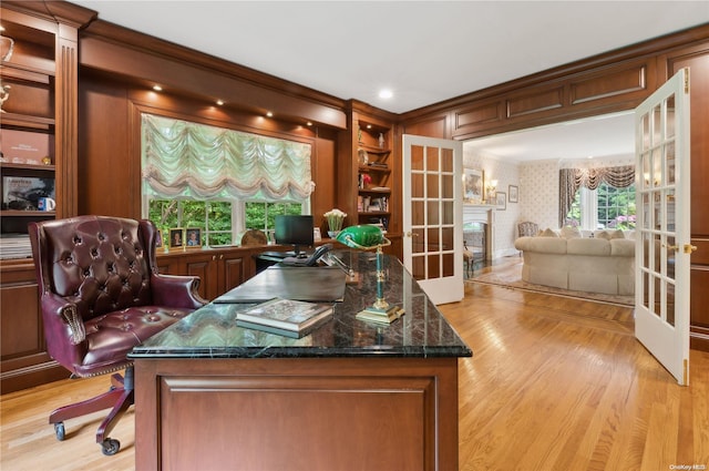 office space featuring light hardwood / wood-style flooring and french doors