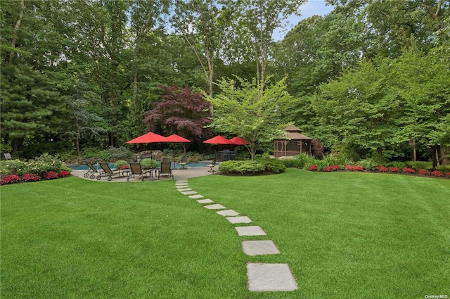 view of yard with a gazebo and a patio