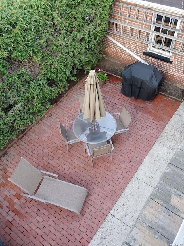 view of patio with a grill