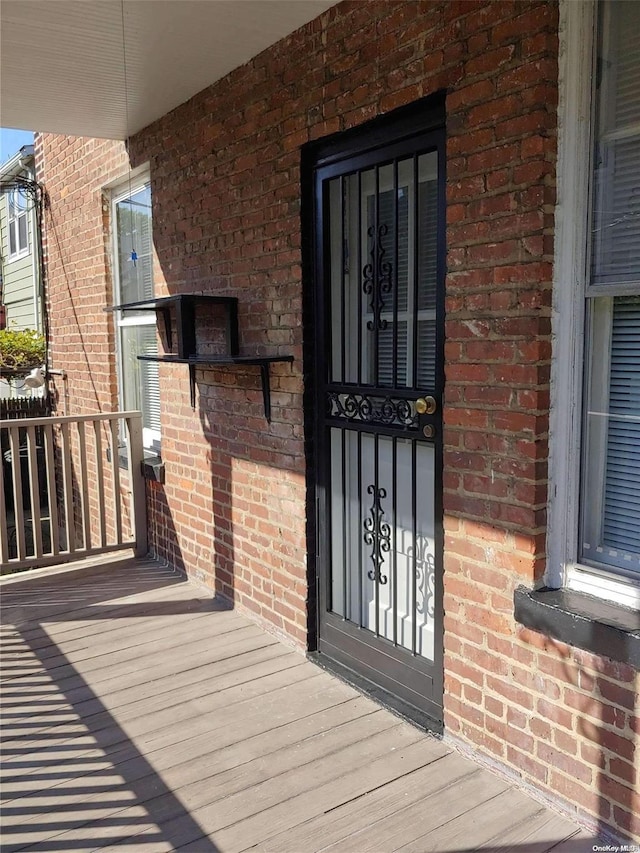 entrance to property with covered porch