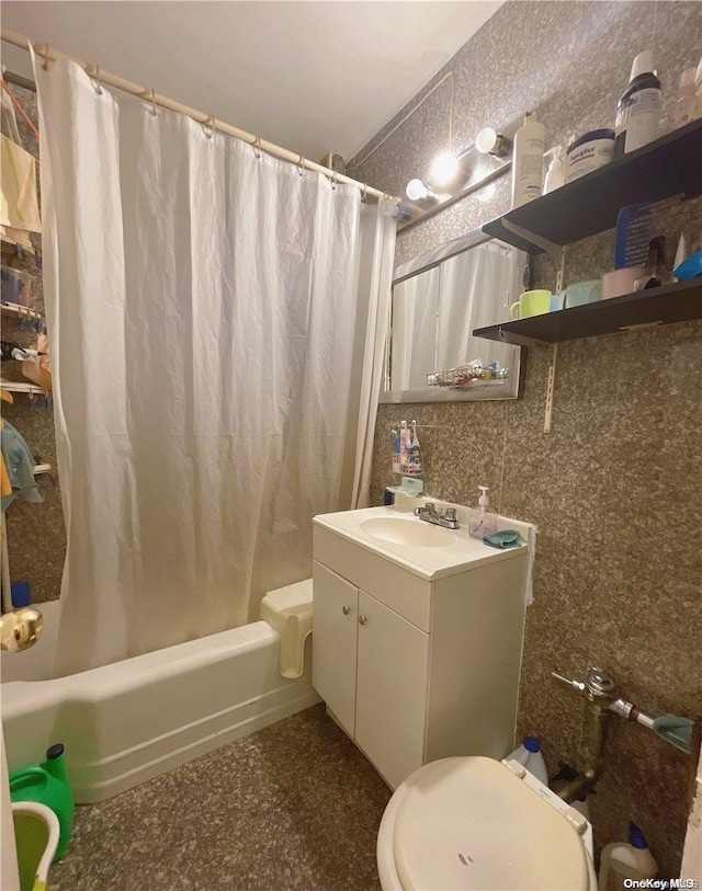 full bathroom with vanity, toilet, and shower / bath combo with shower curtain