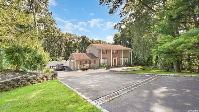 view of front of property with a front lawn