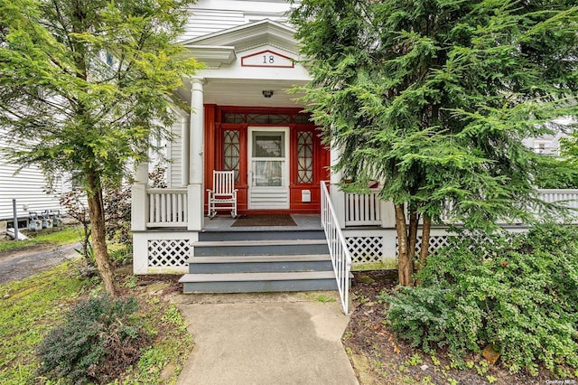 entrance to property with covered porch