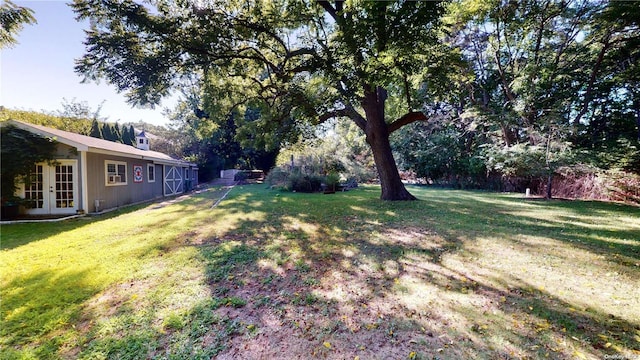 view of yard with french doors