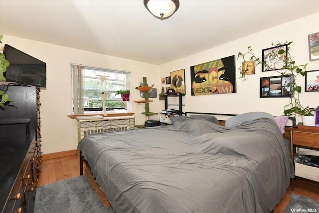 bedroom featuring hardwood / wood-style flooring