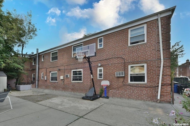 rear view of house featuring a patio area