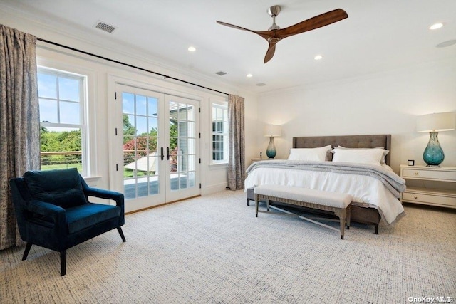 carpeted bedroom featuring ceiling fan, ornamental molding, access to outside, and french doors